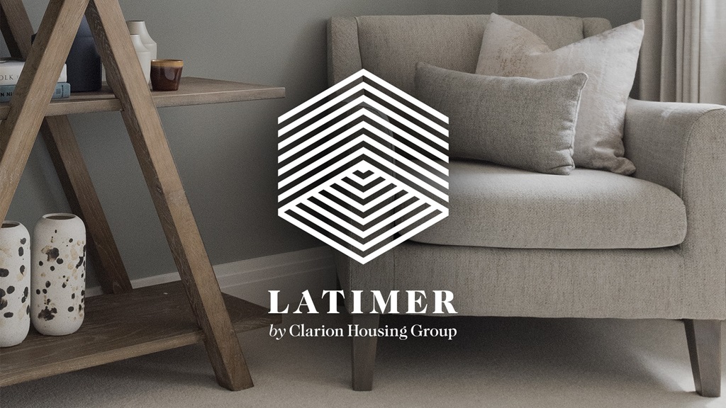 Latimer show home image of armchair and bookshelf with Latimer logo